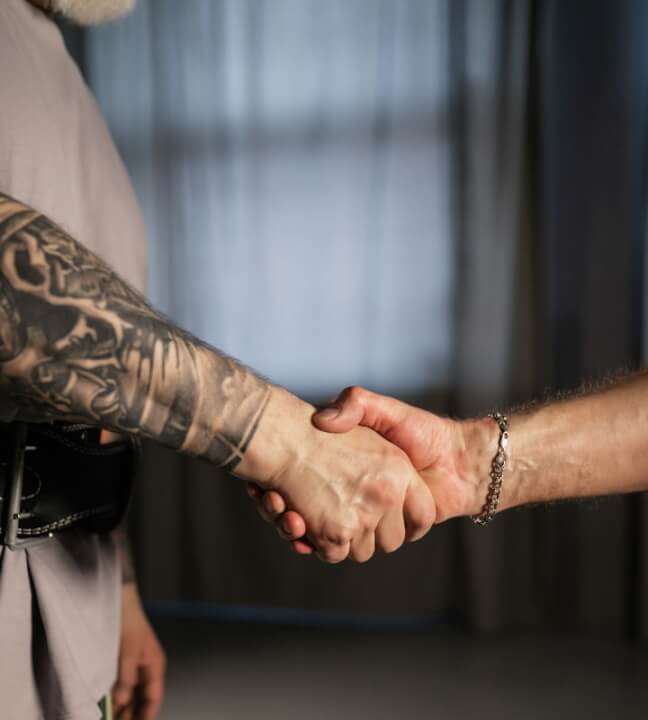 2 men shaking hands