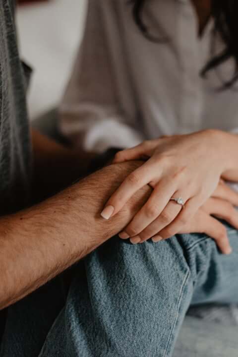 a couple holding hands